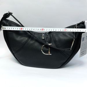 مشخصات کیف چرمی دوشی زنانه وارداتی خارجی مدل هلال (Hobo) - برند Onyx Bag