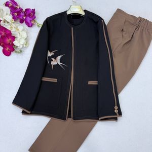 خرید اینترنتی مانتو و شلوار زنانه طرح پرستو