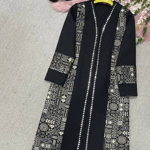 خرید آنلاین مانتومزونی طرح اطلس