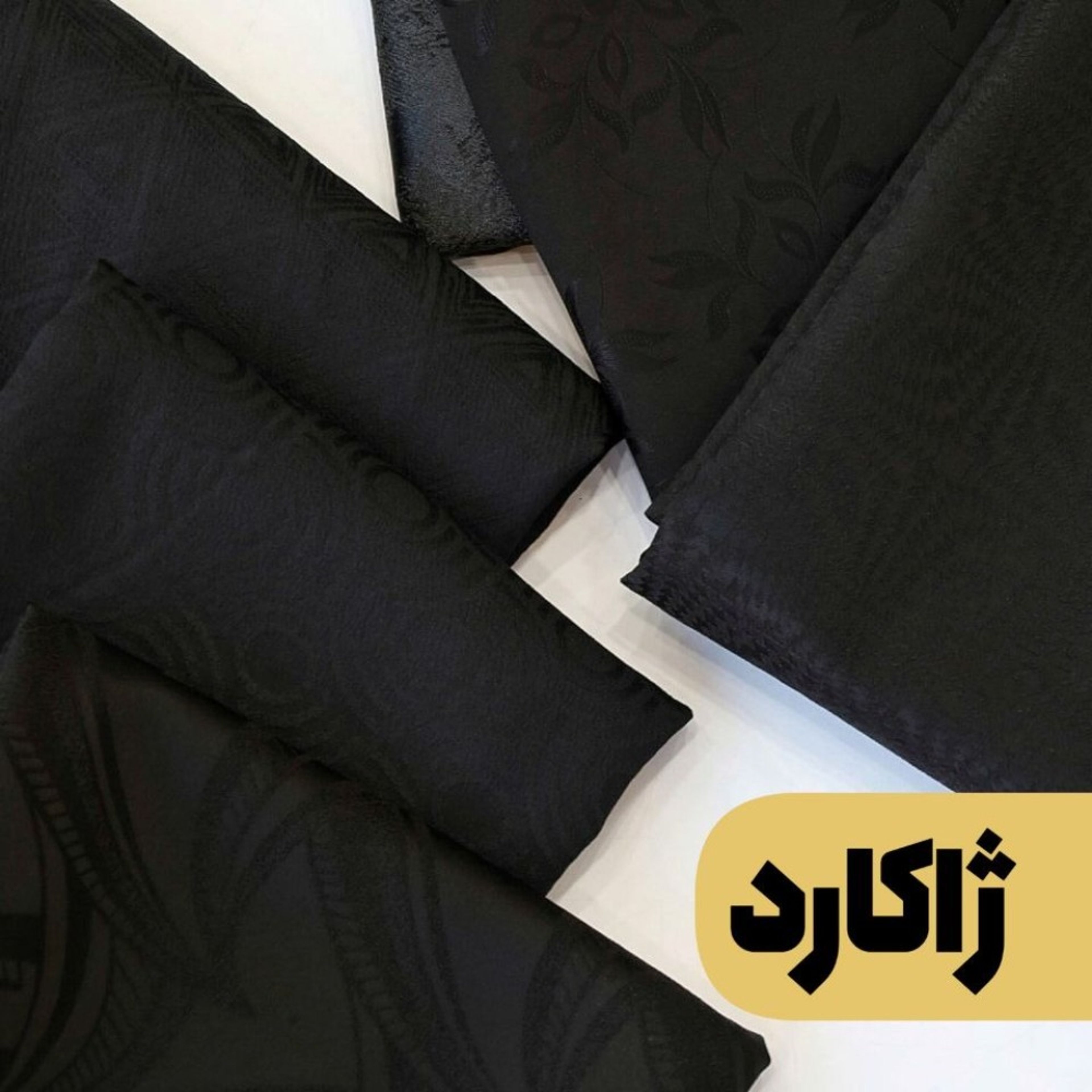 قیمت پارچه ساتن ژاکارد مشکی