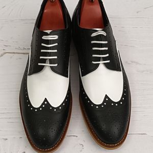 فروش اینترنتی کفش مردانه مجلسی شیک چرم طبیعی مدل ویلسون دورنگ