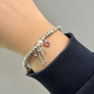 دستبند زنانه مدل پاپیون و قلب