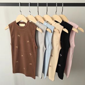 فروش اینترنتی تاپ یقه گرد گلدوزی پاپیون