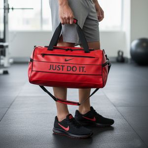 خرید اینترنتی قیمت پکیج کفش ورزشی tigo مشکی قرمز  ساک ورزشی نایکی just do it