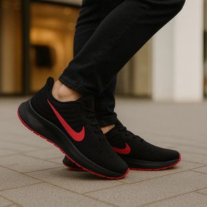 خرید اینترنتی قیمت کفش ورزشی مردانه Nike مدل Tigo زیره قرمز-مشکی