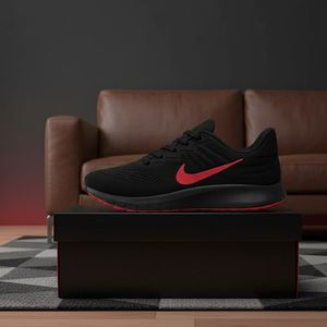 کفش ورزشی مردانه Nike مدل Tigo زیره قرمز-مشکی