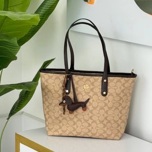 کیف زنانه متریال وارداتی طرح کوچ