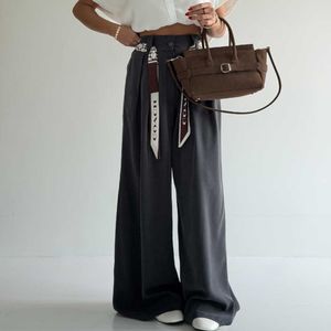 خرید اینترنتی شلوار سیلک COACH کد 102251