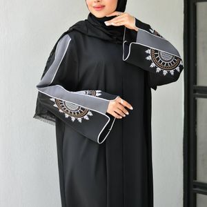 خرید انلاین مانتو عبایی خورشید