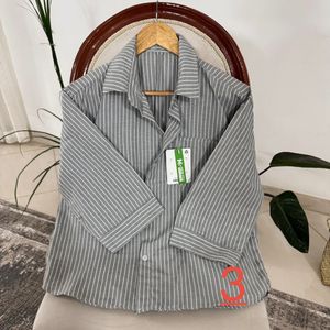 خرید اینترنتی شومیز راه راه ترک