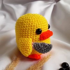 مشخصات عروسک جوجه چاقوکش بافتنی