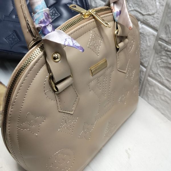 کیف دستی و دوشی زنانه و دخترانه نیم گرد مدل ال وی