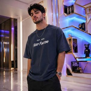 فروش اینترنتی تیشرت مردانه پنبه سوپر NEVER قواره باکسی در 5 رنگ متنوع