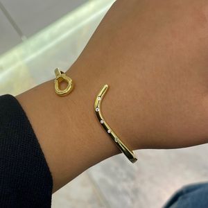 خرید آنلاین بنگل زنانه مدل فشن هندسی 