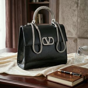 کیف دستی و رودوشی وارداتی مینیمال دسته نگینی