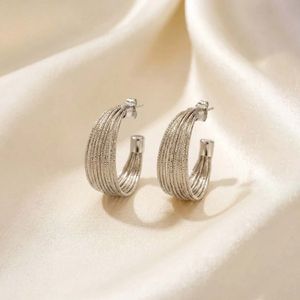 خرید اینترنتی قیمت گوشواره حلقه‌ای تراش خورده نقره ای