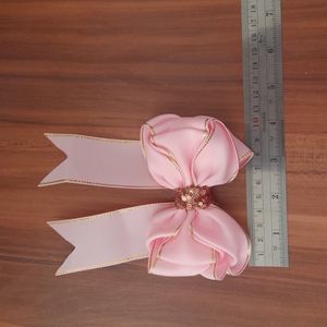 خرید اینترنتی گلسر مجلسی پروانه ای با روبان گروگرین لبه زری
