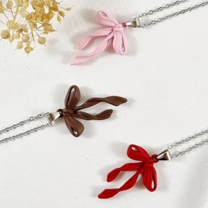 گردنبند دخترانه مدل پاپیون رنگی مات  | دلسامه