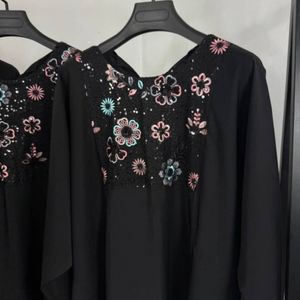 خرید انلاین مانتو عبایی شکوفه