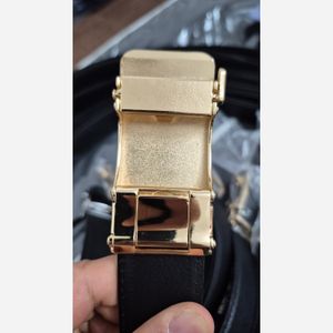 خرید اینترنتی قیمت کمربند مردانه ریلی سگک فلزی طلایی