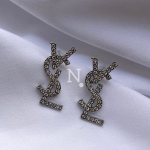 قیمت ارزان گوشواره زنانه مدل جواهری YSL