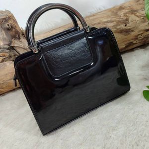 خرید آنلاین کیف مجلسی ورنی زنانه مدل آهو