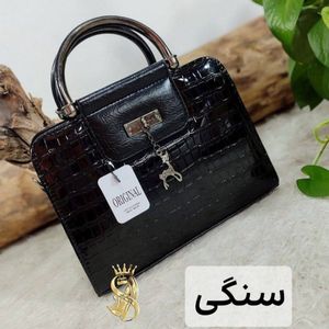مشخصات کیف مجلسی ورنی زنانه مدل آهو