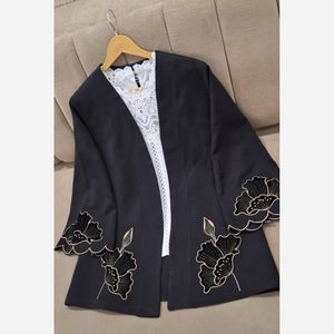 خرید اینترنتی قیمت مانتو مزونی آلند گلدزوی شده تا سایز 50