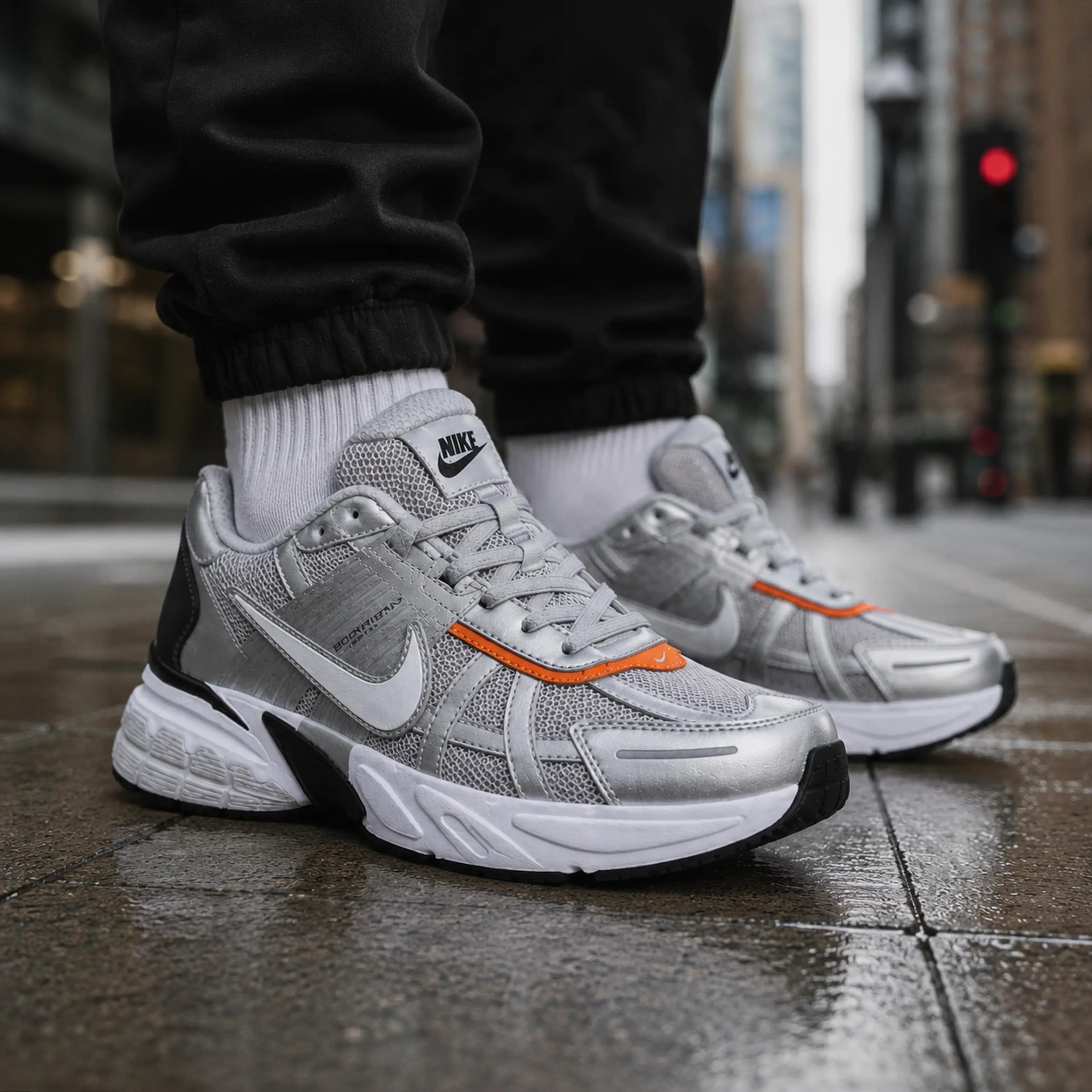 خرید اینترنتی قیمت کفش ورزشی نایک وی تو کی ران NIKE V2K RUNطوسی