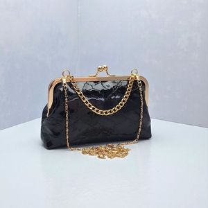 کیف مجلسی زنانه طرح رعدبرقی