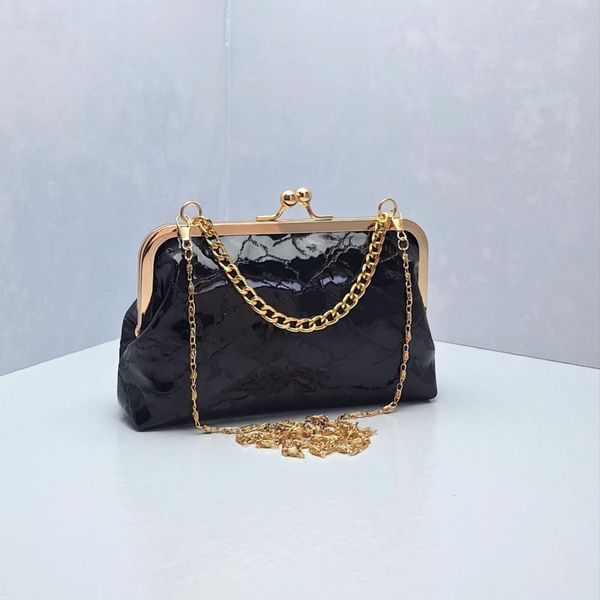 کیف مجلسی زنانه طرح رعدبرقی