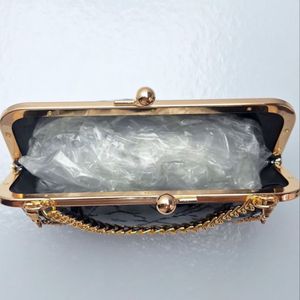 خرید اینترنتی کیف مجلسی زنانه طرح موجی