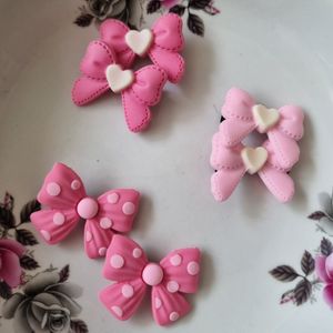 پک 2 عددی گیره انبری موی دخترانه طرح پاپیون رنگ صورتی