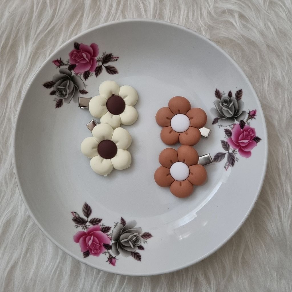 خرید انلاین پک2 عددی گیره مو انبری دخترانه طرح گل قهوه‌ای