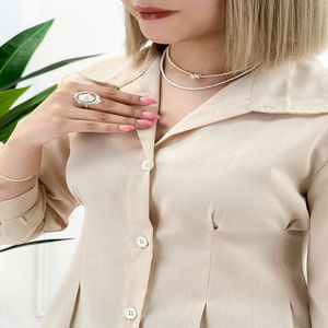 خرید اینترنتی قیمت شومیز کمر باریک دلوان زنانه - استخوانی