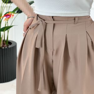 خرید اینترنتی قیمت شلوار بگ دخترانه کمربندی - کرم‌تیره