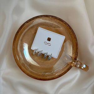 خرید اینترنتی گوشواره حلقه‌ای دو ردیفه نگین‌دار