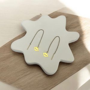 فروش اینترنتی گوشواره زنانه بخیه ای طرح لب کد 3337034