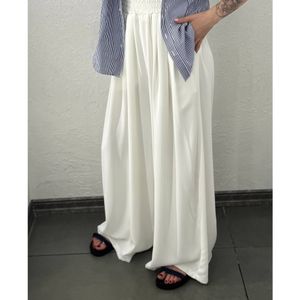 خرید اینترنتی قیمت شلوار پارچه ای فول بگ ریزشی زنانه