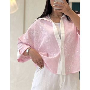 خرید اینترنتی شومیز طرح گل زنانه