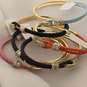 قیمت ارزان دستبند چرم طرح طلا