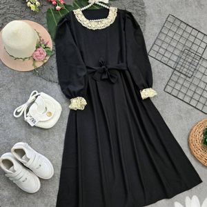 خرید آنلاین مانتو زنانه بنین