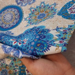 فروش اینترنتی یک متر پارچه ملحفه ای مدل گل فیروزه ای عرض دو متر