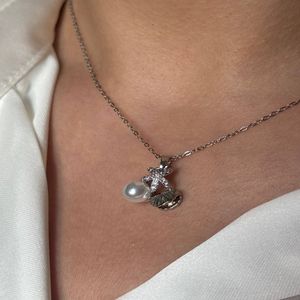گردنبند با آویز صدف مروارید و ستاره