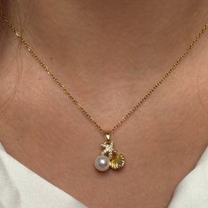 گردنبند با آویز صدف مروارید و ستاره