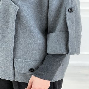 خرید اینترنتی قیمت کت زنانه ژیکان پلار جلوباز