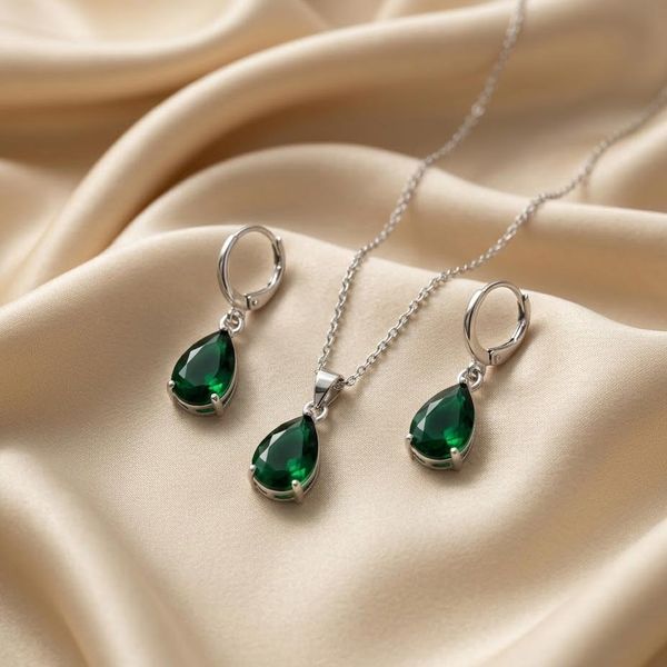 نیم ست طرح اشکی نقره‌ای با نگین سبز