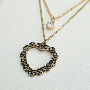 فروش اینترنتی گردنبند دو ردیفه طلایی آویز قلب و نگین