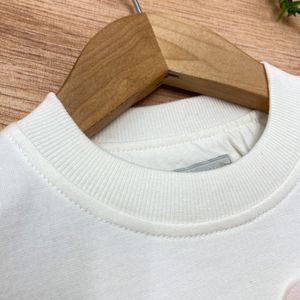خرید اینترنتی قیمت بلوز دورس دخترانه مدل گل برجسته