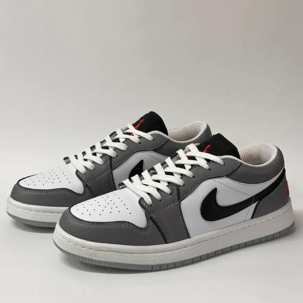 خرید اینترنتی قیمت کتونی نایک ایر جردن 1 لو سفید طوسی | Air Jordan 1 Low Smoke Grey